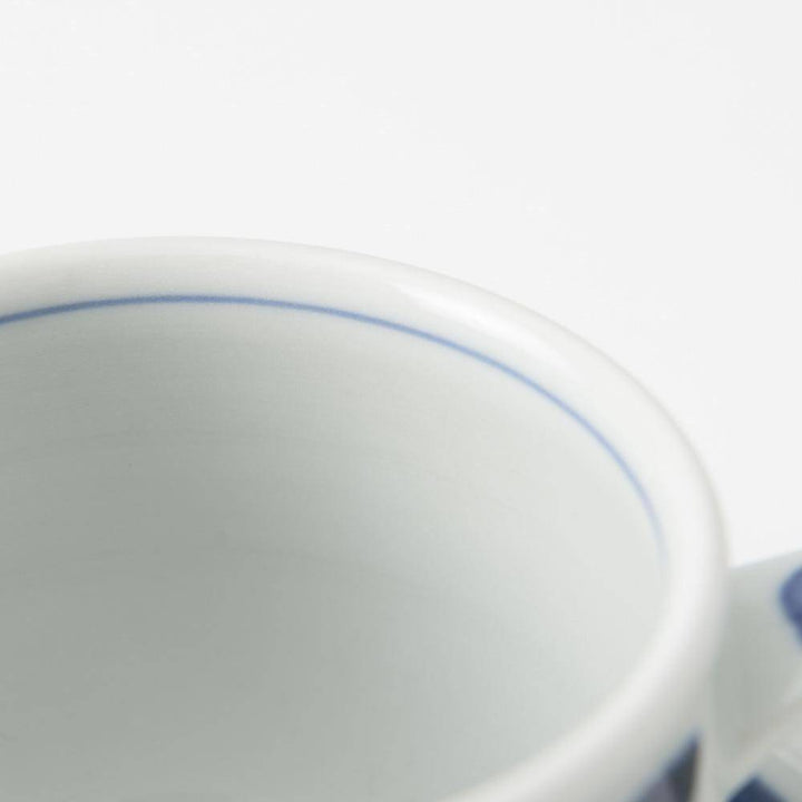 Red and Indigo Chrysanthemum Cup and Saucer